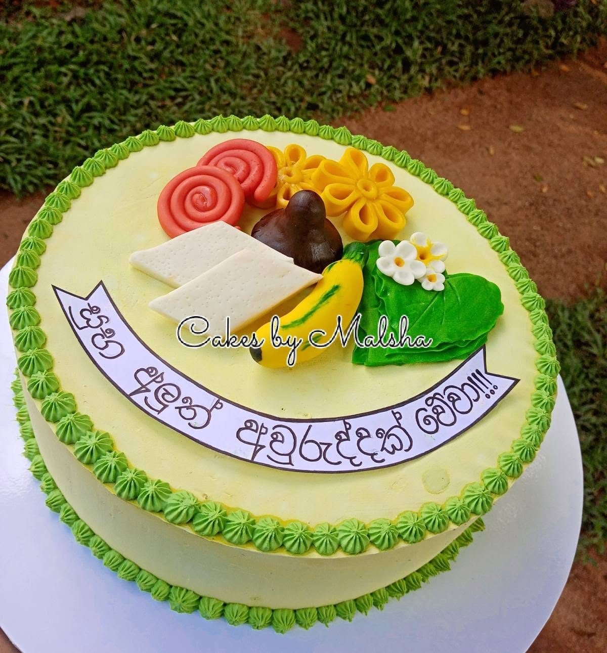 Sinhala & Tamil New Year (Avurudu) cake with traditional sweets