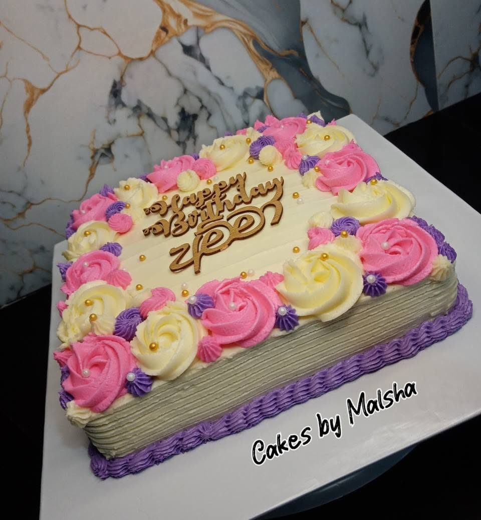 Square birthday cake with buttercream roses