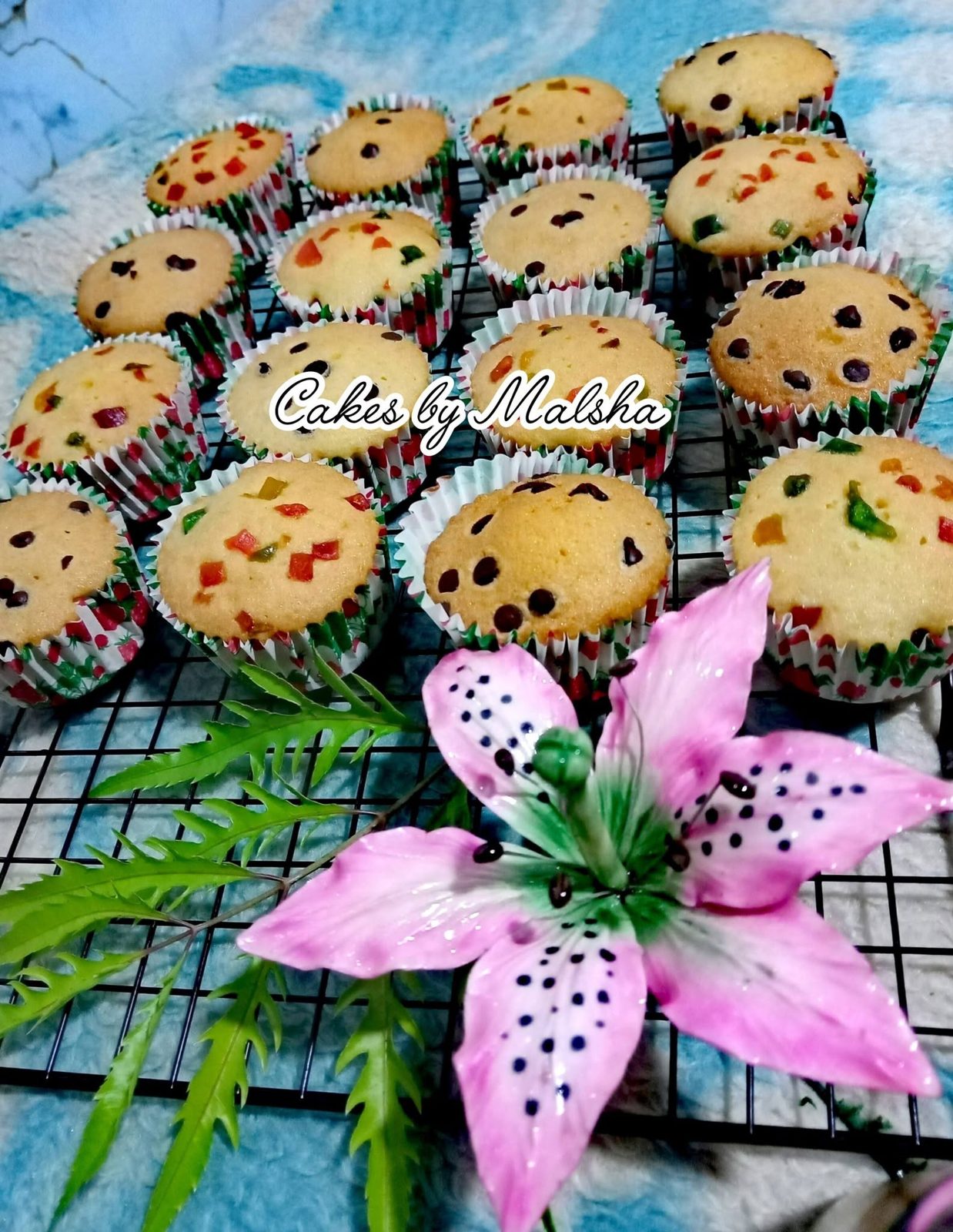 Sprinkle cupcakes with a sugar lily
