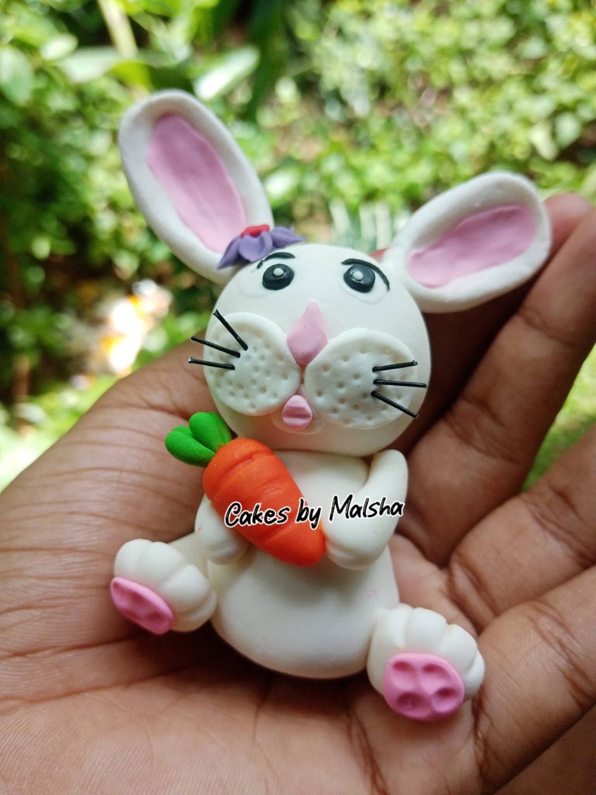 Hand-made sugar bunny with a carrot