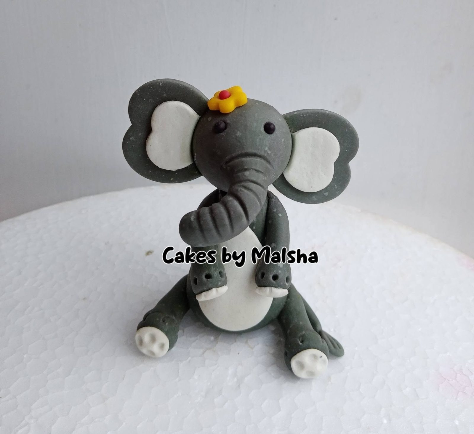 Hand-made sugar elephant with a crown