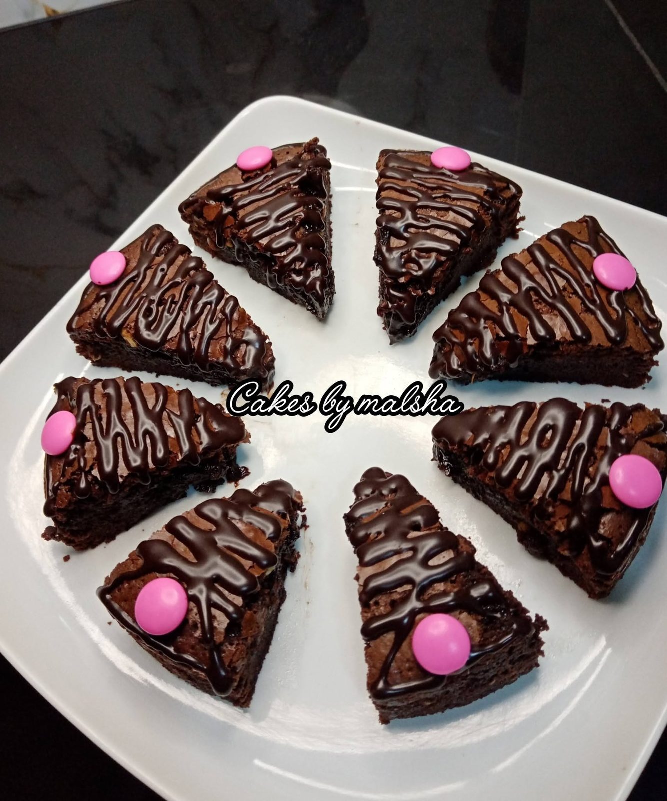 Chocolate cake slices with chocolate drizzle